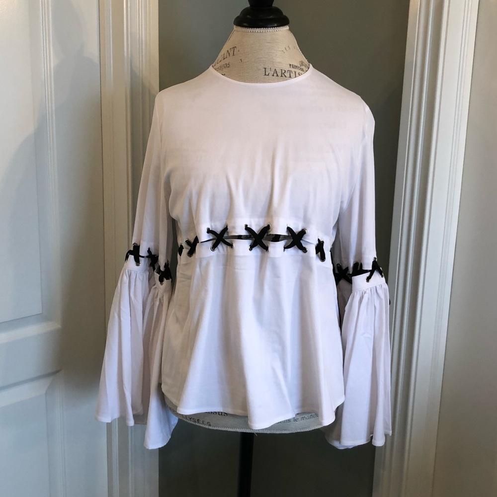 White top with cutouts